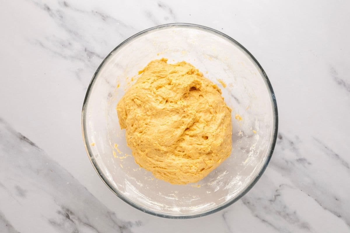 A horizontal image of the artisan pumpkin sourdough dough that has been rested for around an hour.