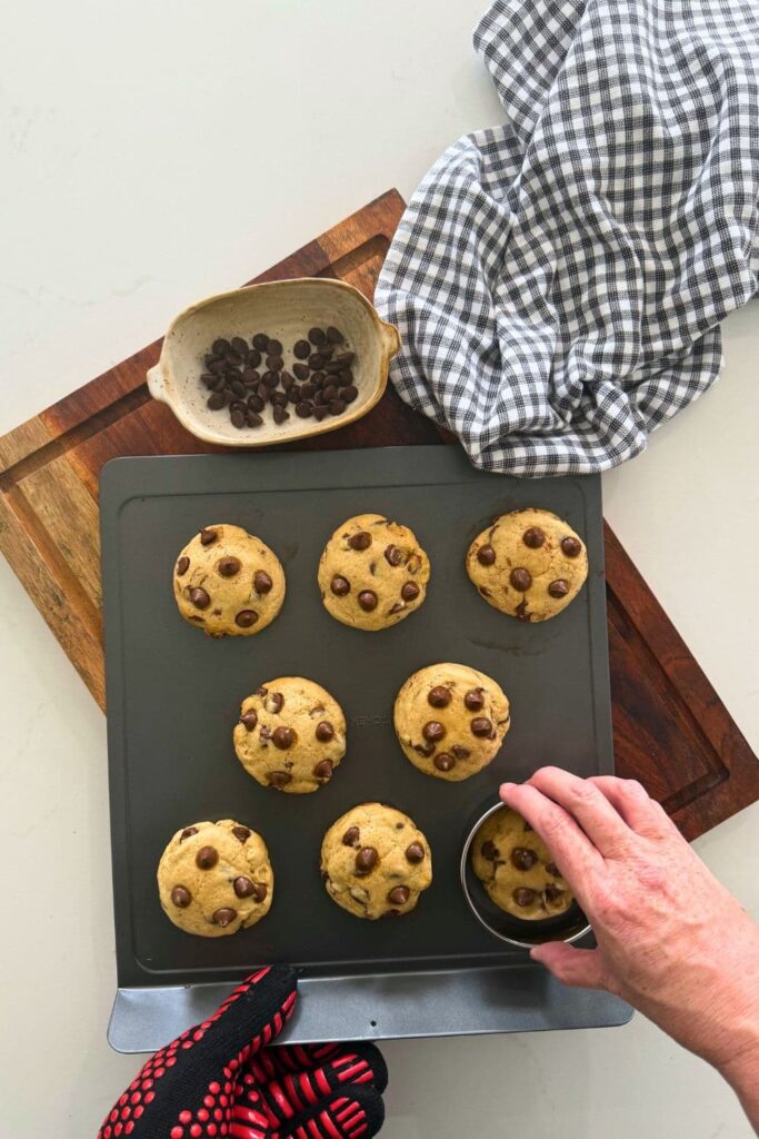 Sourdough chocolate chip cookies that have just been baked and have been taken out of the oven.