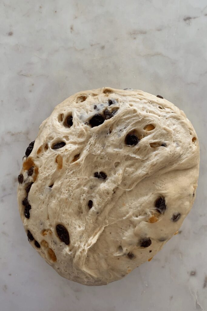 Dough after bulk fermentation in sourdough hot cross buns recipe.