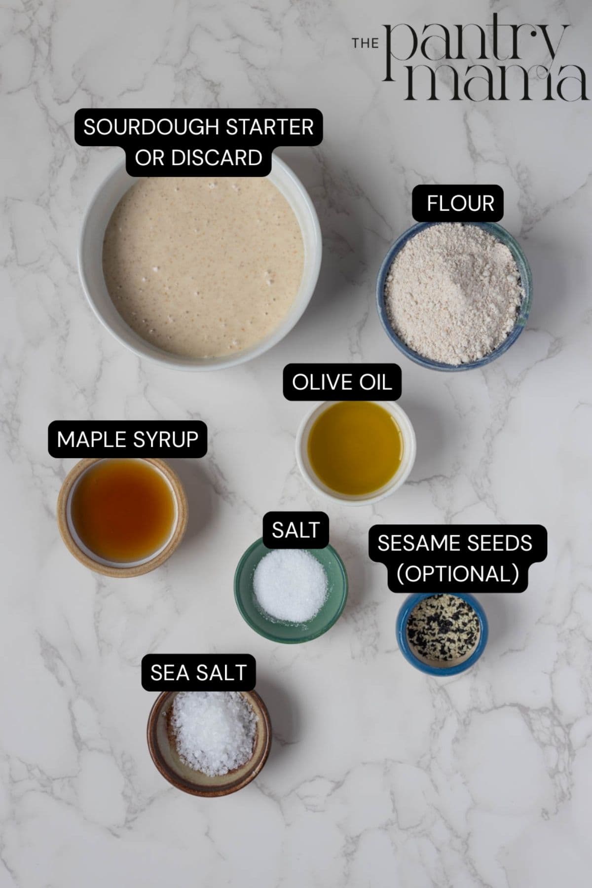 Flat lay of ingredients for crunchy sourdough breadsticks.