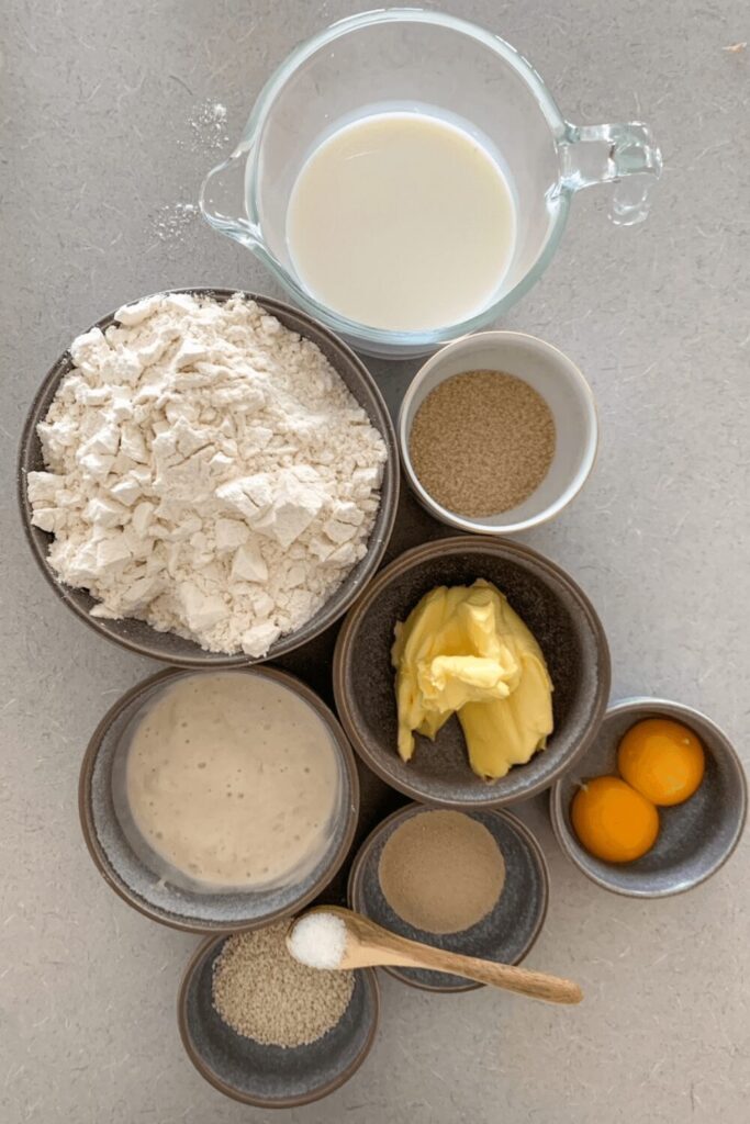 Flat lay of ingredients necessary to make sourdough discard hamburger buns.