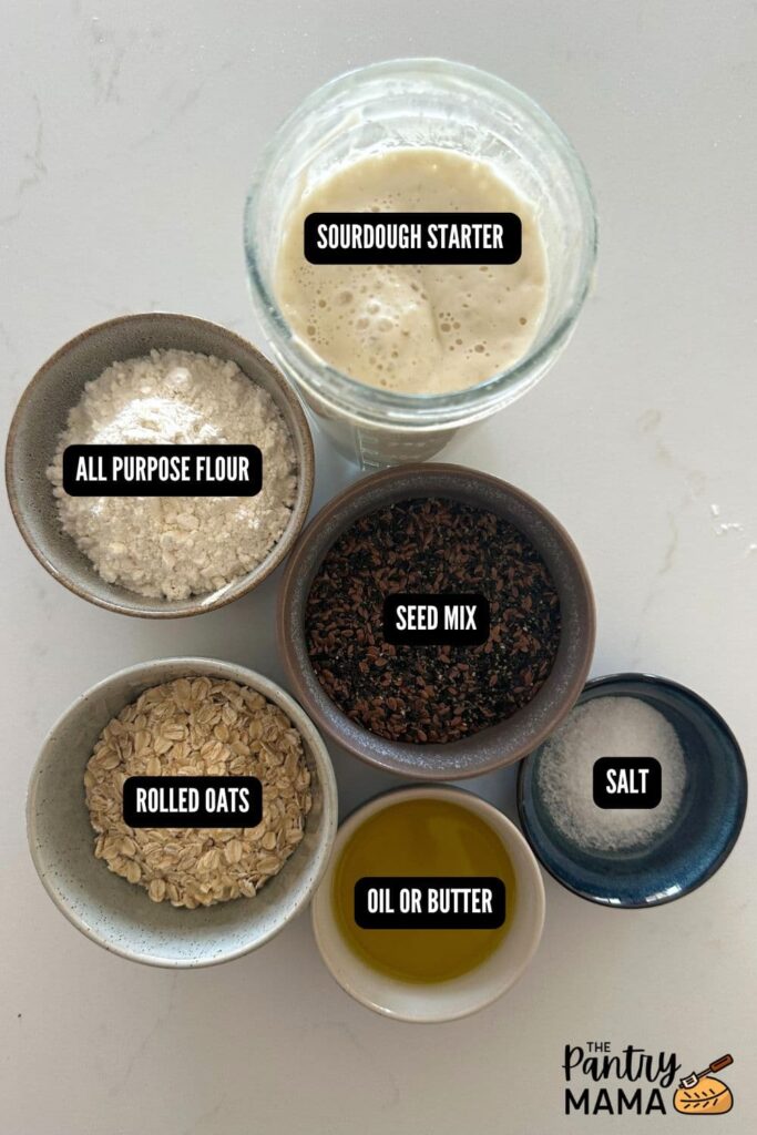 Flat lay of ingredients needed to make seeded sourdough crackers.