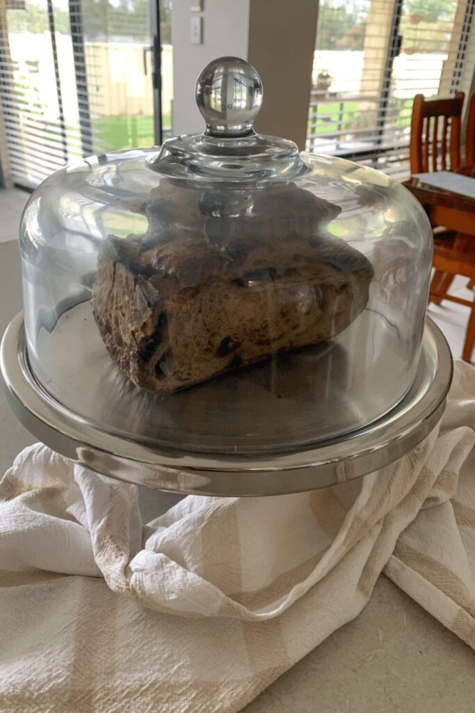 Store sourdough bread under glass cloche