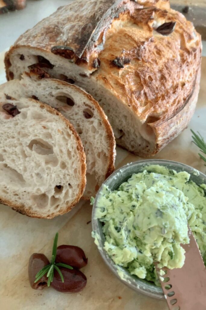 sourdough olive bread served with whipped herb butter