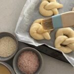 Egg washing pretzels before adding salt and or sesame seeds