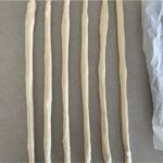 Pretzel dough rolled into 45cm long strips