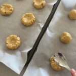 sourdough Anzac Biscuits flattened with a wet spoon