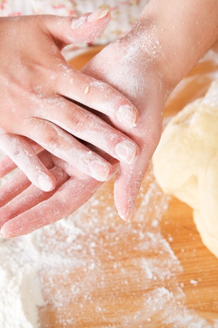 Dry hands from mixing bread dough and sourdough