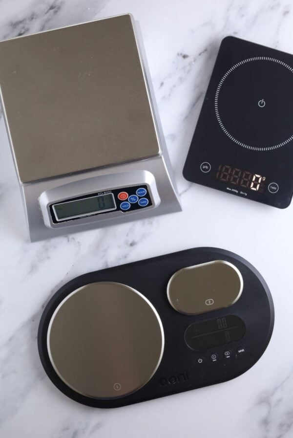 Best baking scale for sourdough bread - 3 scales in a flat lay image.