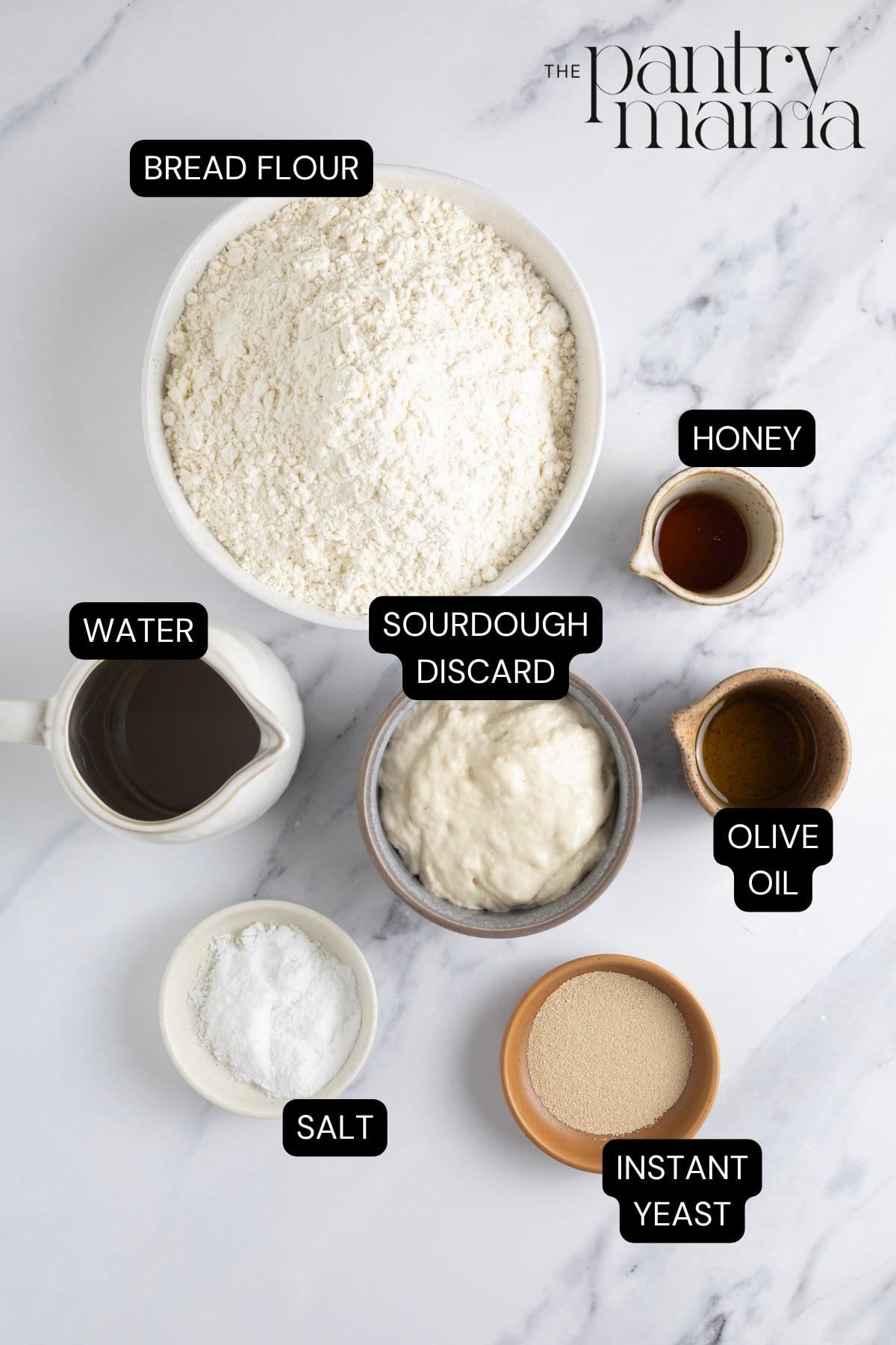 Flat lay of ingredients necessary to make sourdough discard pizza crust.