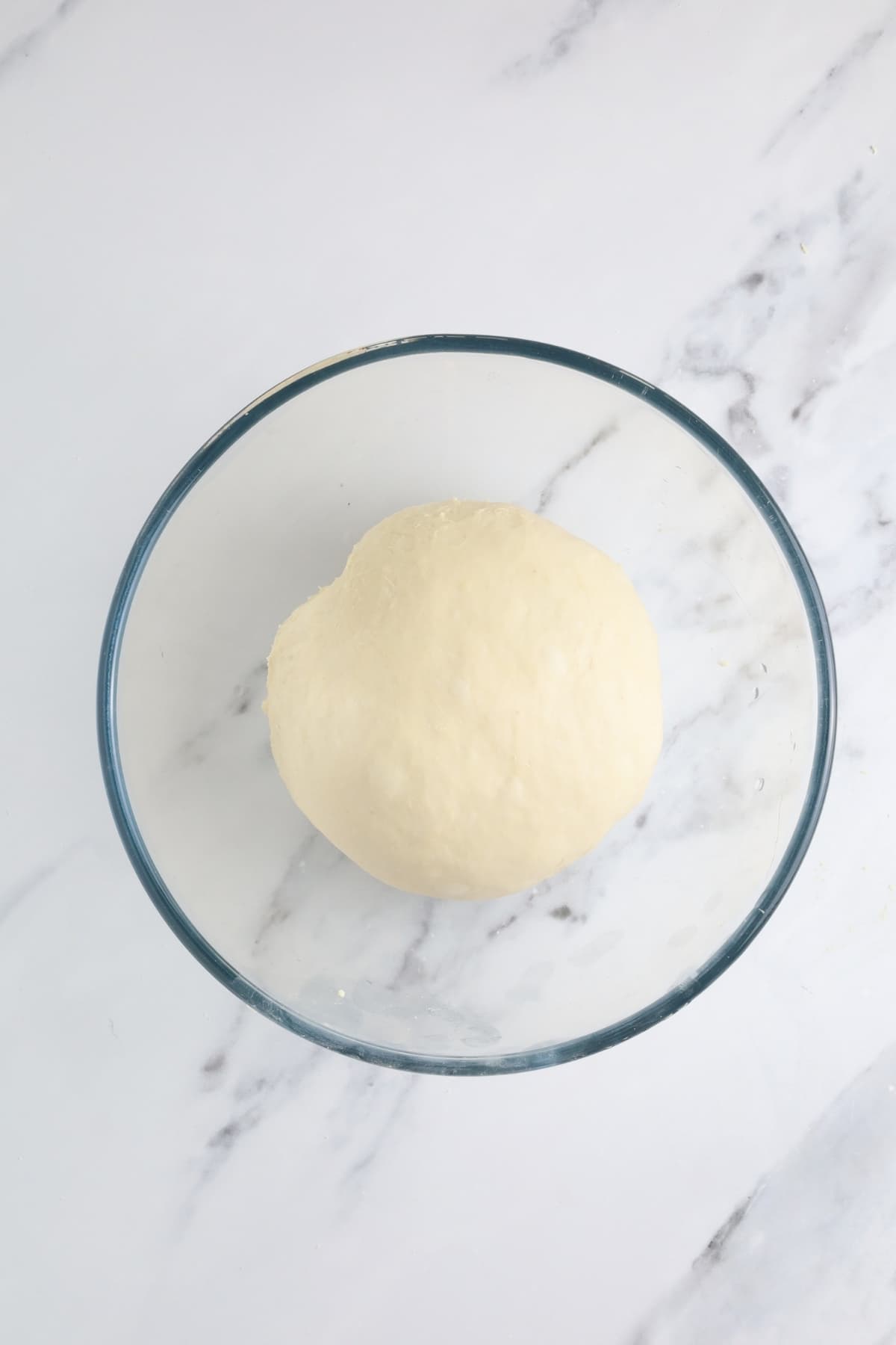 Sourdough discard pizza dough at the start of bulk fermentation.