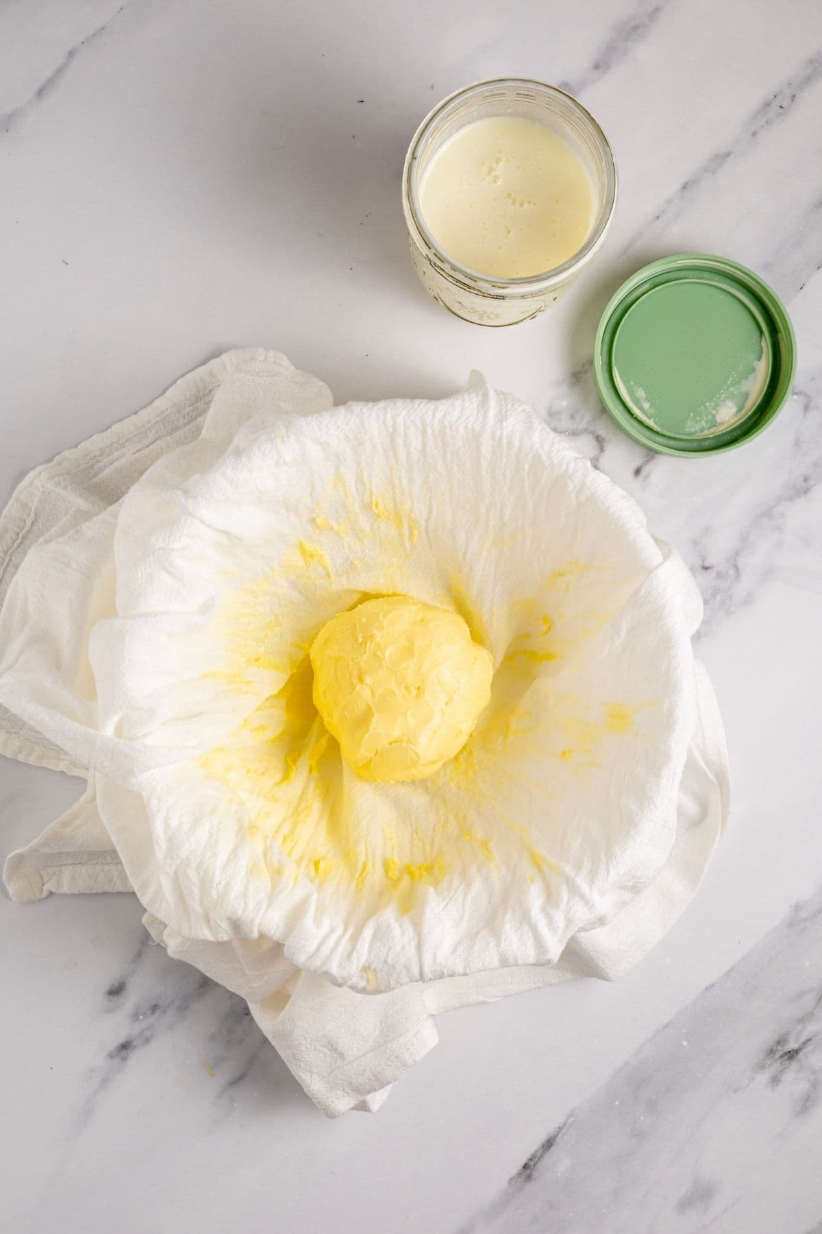 A photo showing the yield of buttermilk and cultured butter.