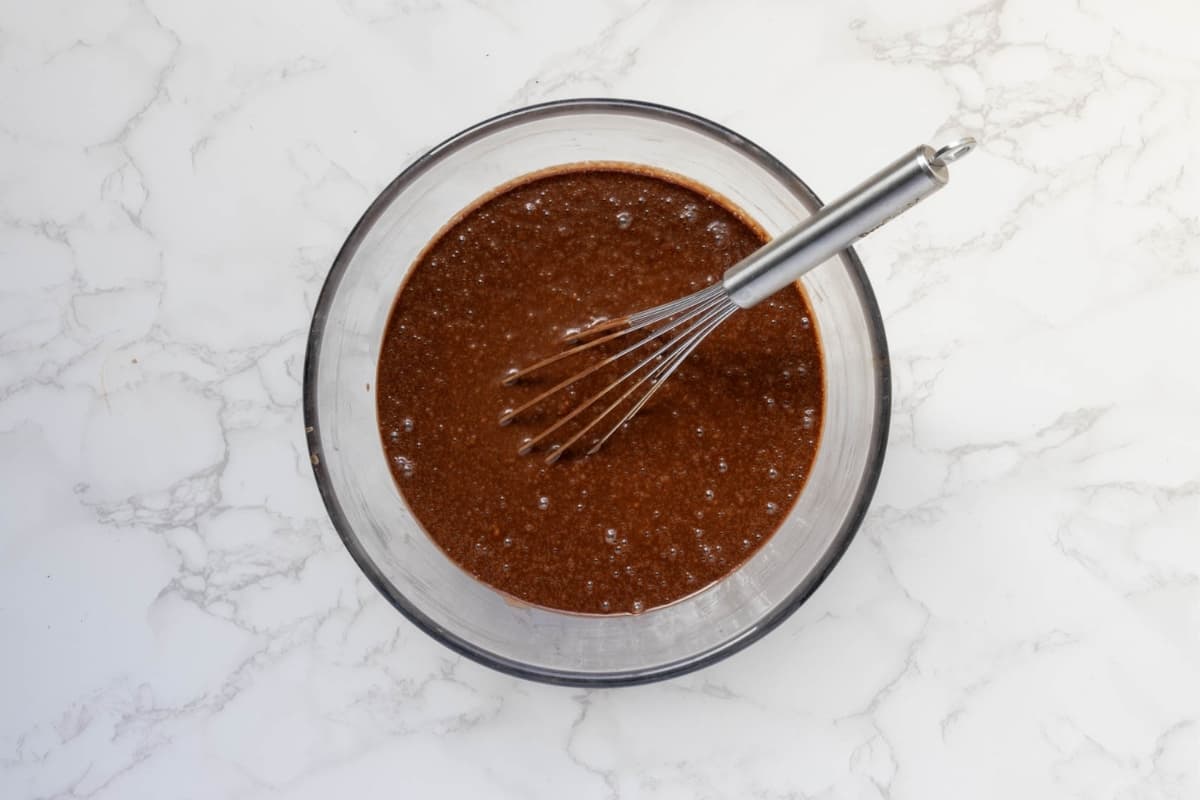 Smooth chocolate sourdough cake batter mixed until fully combined and ready to bake.
