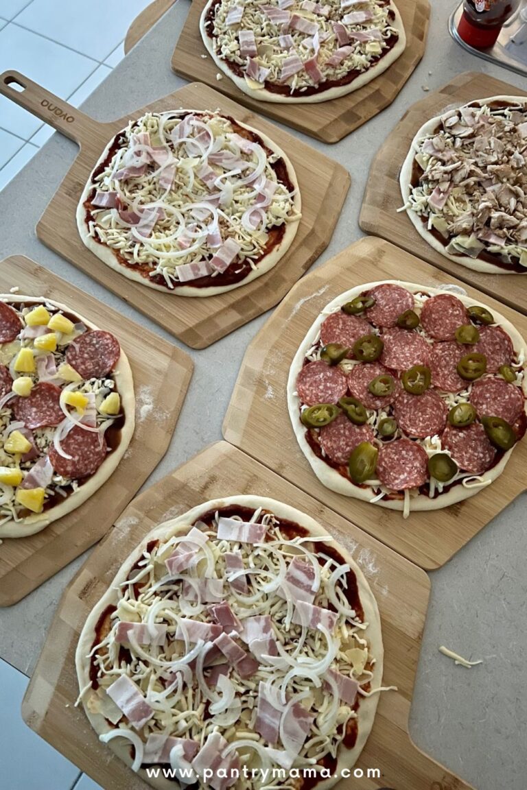 Best pizza toppings for homemade pizza - this photo shows 6 homemade pizzas all with different toppings.