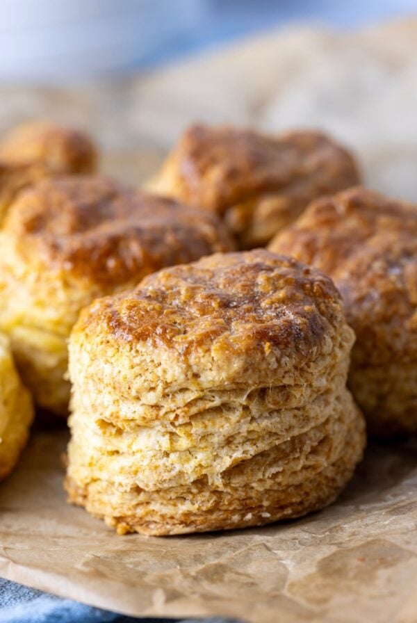 A close up photo of a flaky sourdough biscuit.