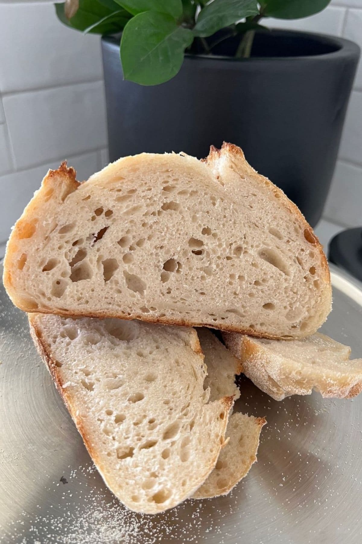 A loaf of sourdough demonstrating a dense, gummy crumb.