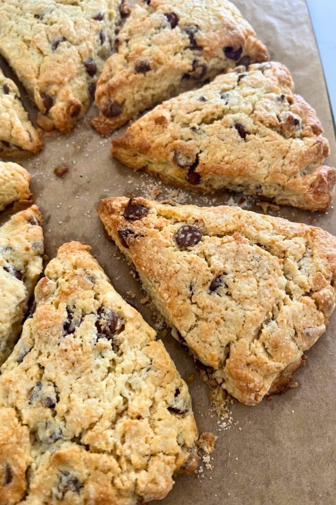 A tray of sourdough chocolate chip scones baked into wedges.