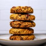 A stack of sourdough breakfast cookies on a white plate.