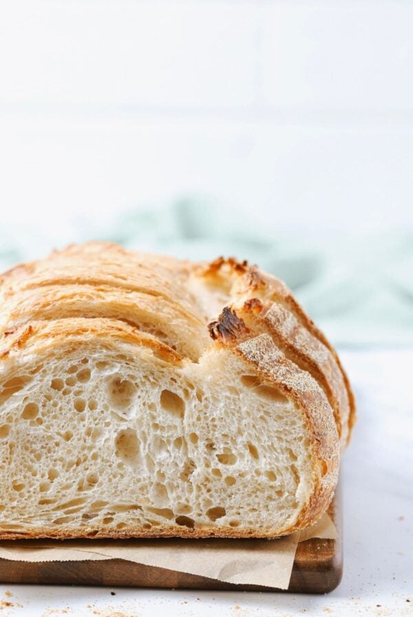 Image showing what sourdough bread should actually look like - a loaf photographed front on so you can see the open crumb inside.