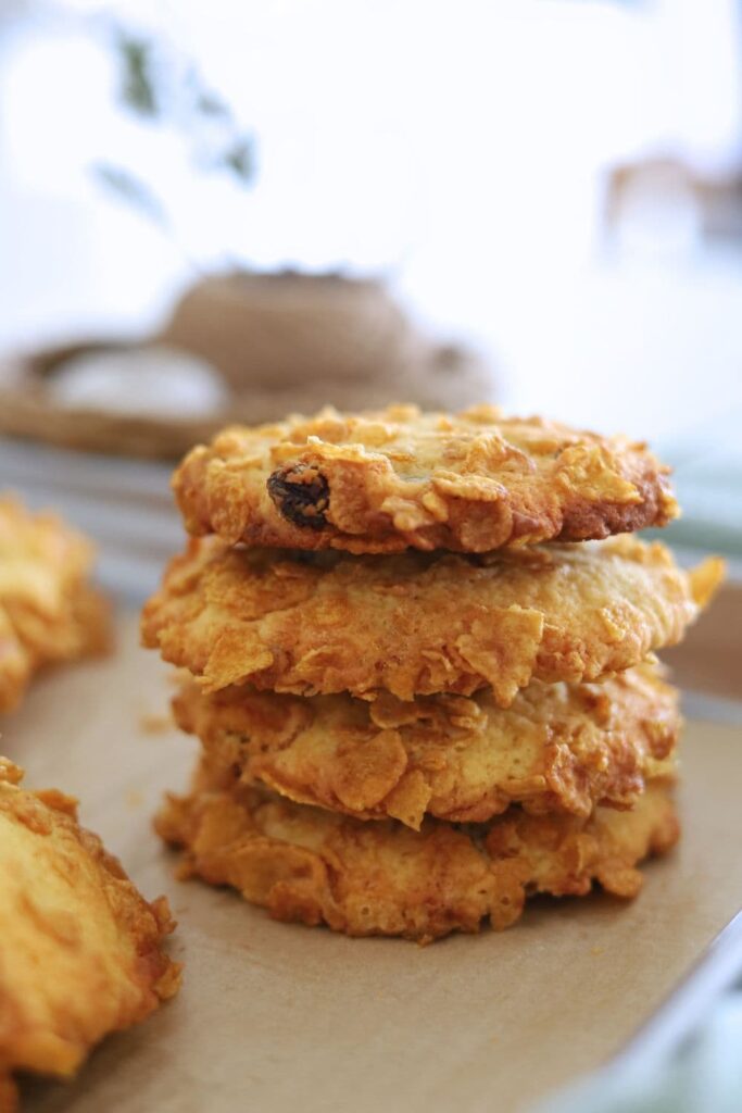 A stack of 4 sourdough cornflake raisin cookies.