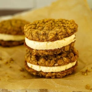 SOURDOUGH OATMEAL CREAM PIE cookie sandwiches. There are two of these stacked on top of each other. This is the recipe feature image.