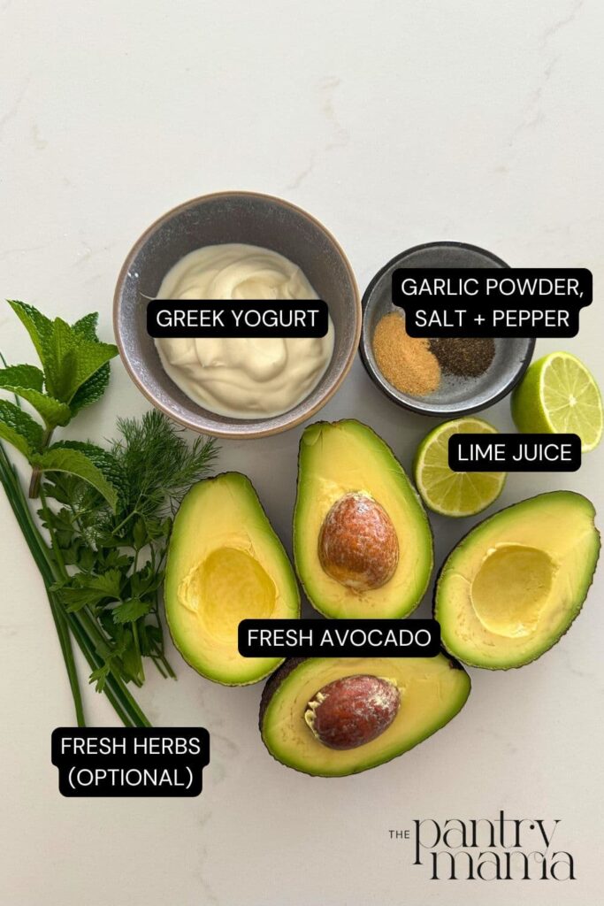 Flat lay of ingredients necessary to make creamy avocado dip.