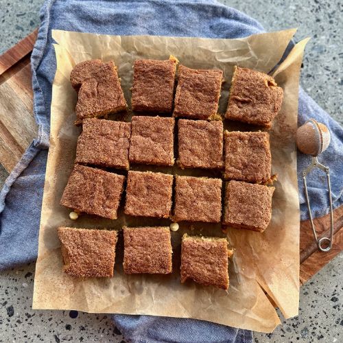 Sourdough dessert bars on parchment paper.