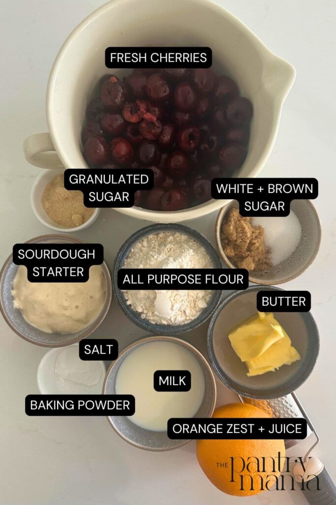 Flat lay of ingredients necessary to make a sourdough cherry cobbler.