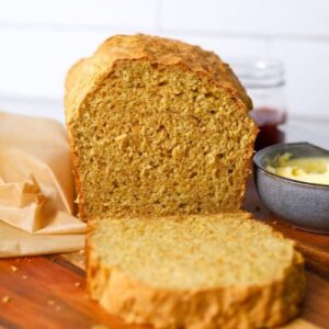 Loaf of sourdough Irish brown bread that has been sliced open so you can see the crumb inside.