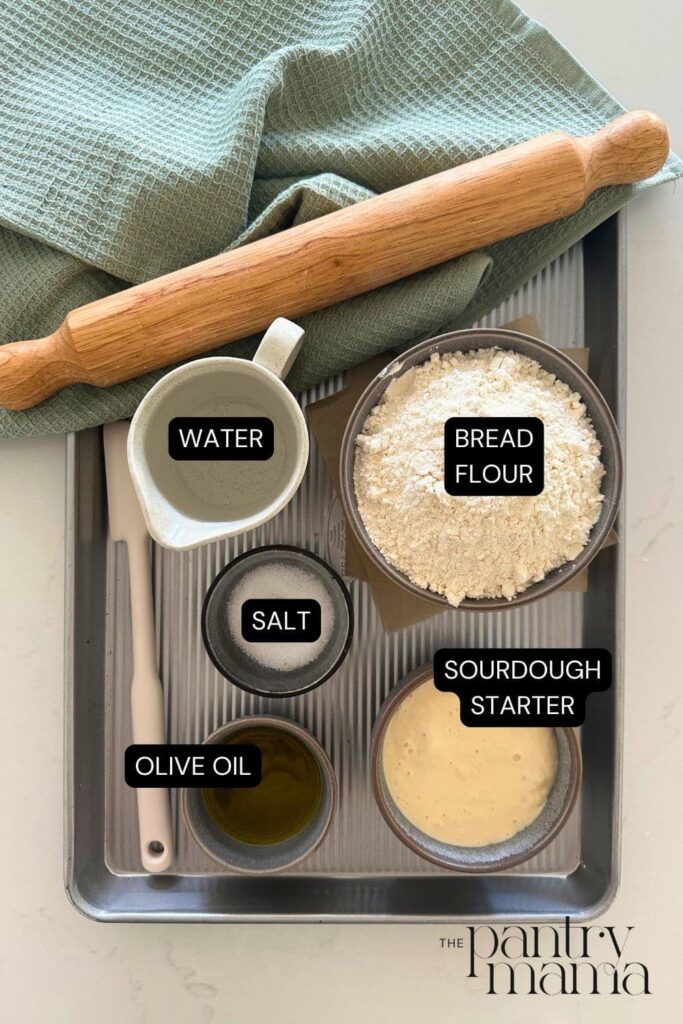 Flat lay of ingredients necessary to make sourdough pita bread.