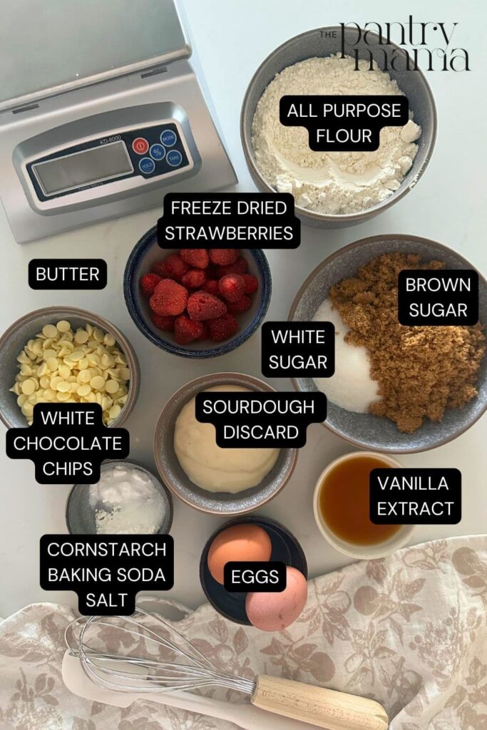 Flat lay of ingredients necessary to make a loaf of strawberries and cream sourdough bread.
