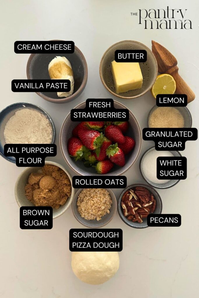 Flat lay of ingredients necessary to create strawberry crumble sourdough pizza.