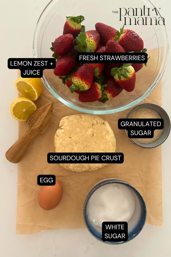 Ingredients necessary to make a sourdough discard strawberry galette.