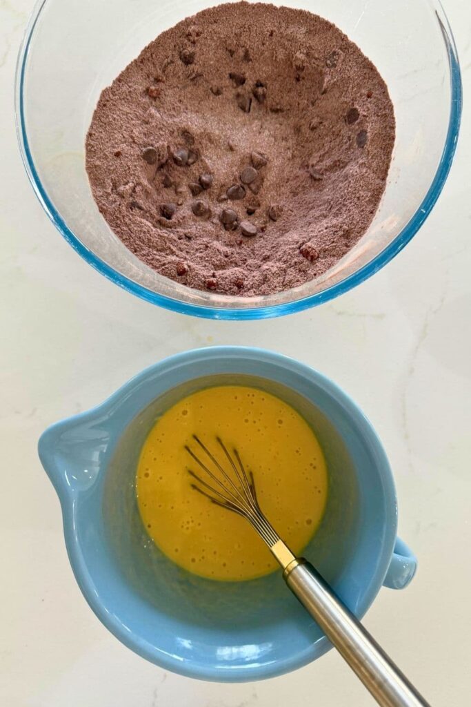 Sourdough cosmic brownies wet and dry ingredients in separate bowls.