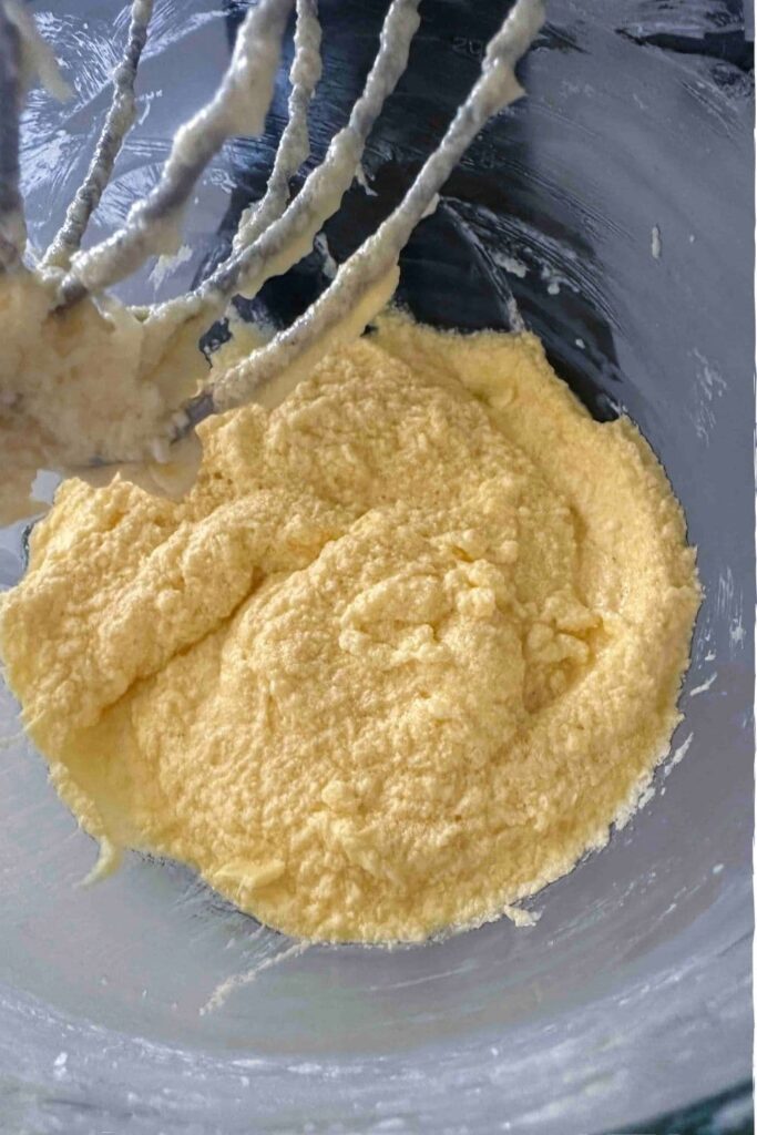 wet ingredients in a mixing bowl for sourdough pound cake recipe. 