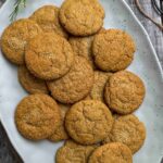 sourdough ginger molasses cookies on serving plate.