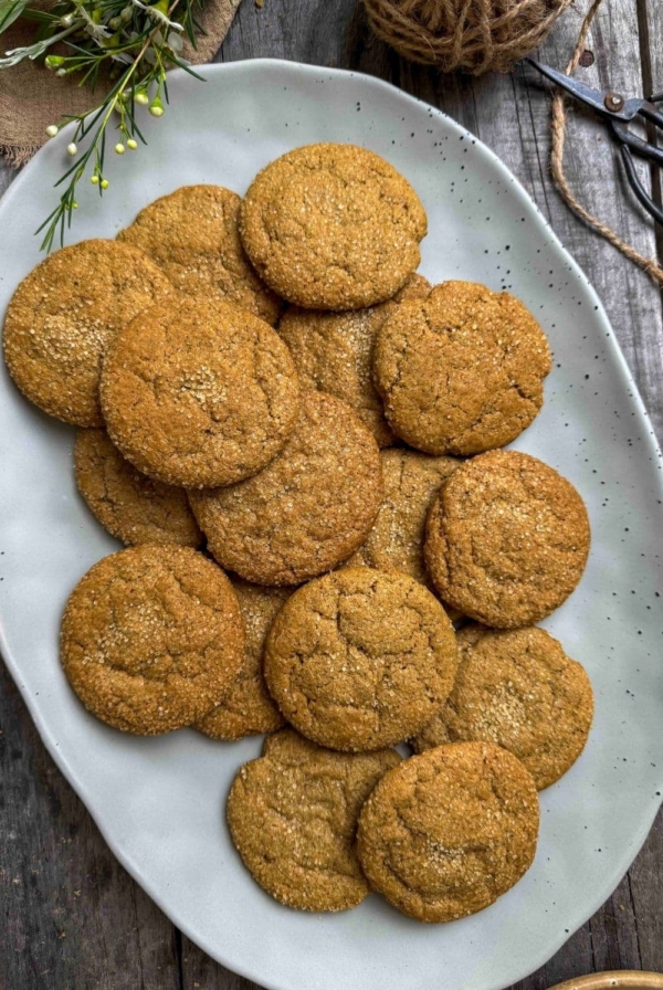 sourdough ginger molasses cookies on serving plate.
