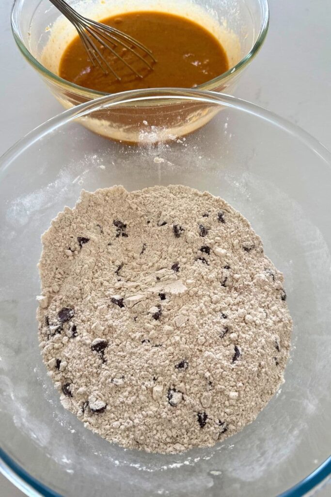 Dry ingredients in bowl to make dough for sourdough pumpkin chocolate chip cookies.