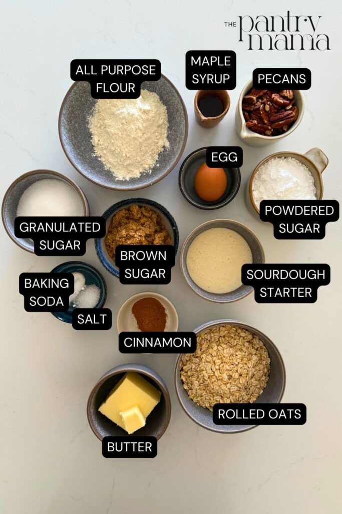 Flat lay of ingredients necessary to make sourdough maple pecan oatmeal cookies.