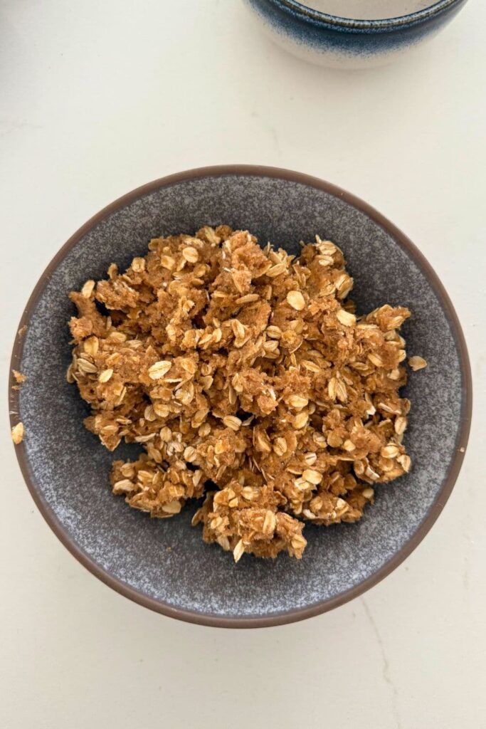 Mixed streusel topping for sourdough apple cinnamon rolls.