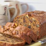 Sourdough date and walnut loaf cake sliced and ready to add butter.