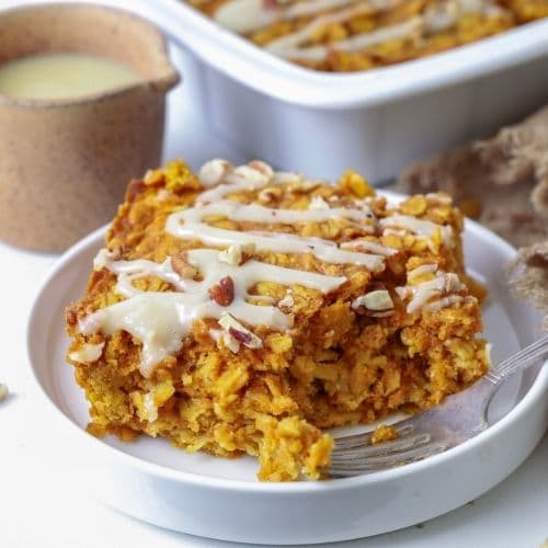 Slice of sourdough pumpkin pie baked oatmeal on a plate.