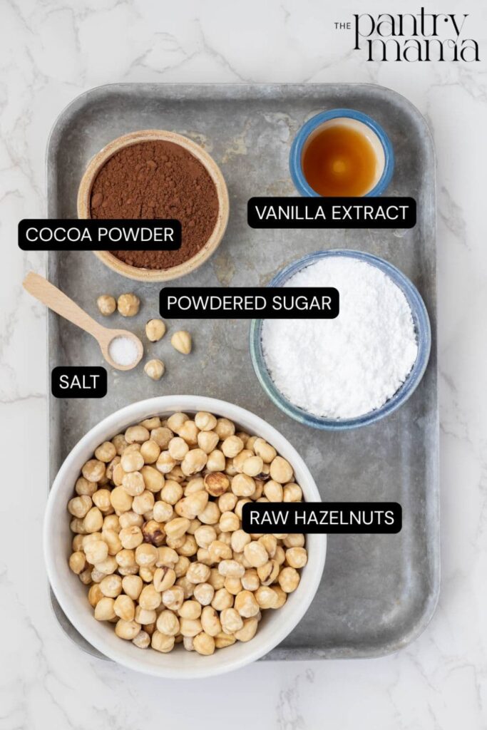 Labeled ingredients on counter for homemade Nutella.