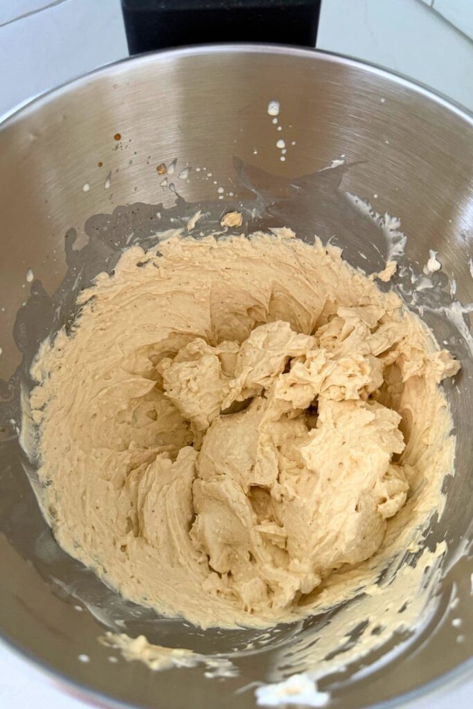 All ingredients mixed together in a stand mixer for whipped caramel dip.