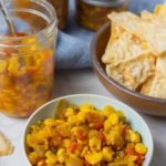 An image of a bowl of corn relish with text overlay for a Pinterest Pin.