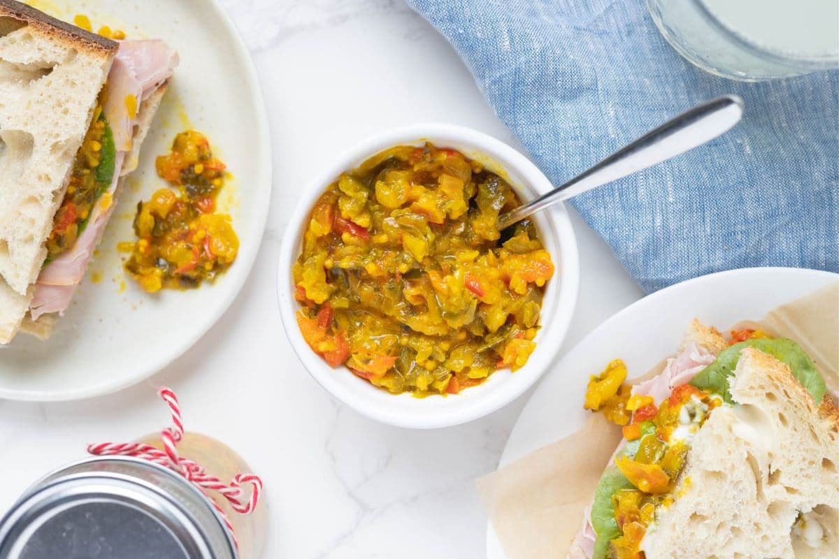 Mustard relish in a bowl on the counter for adding to sandwiches.