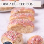 Sourdough discard iced buns on the counter with text overlay for a Pinterest Pin image.