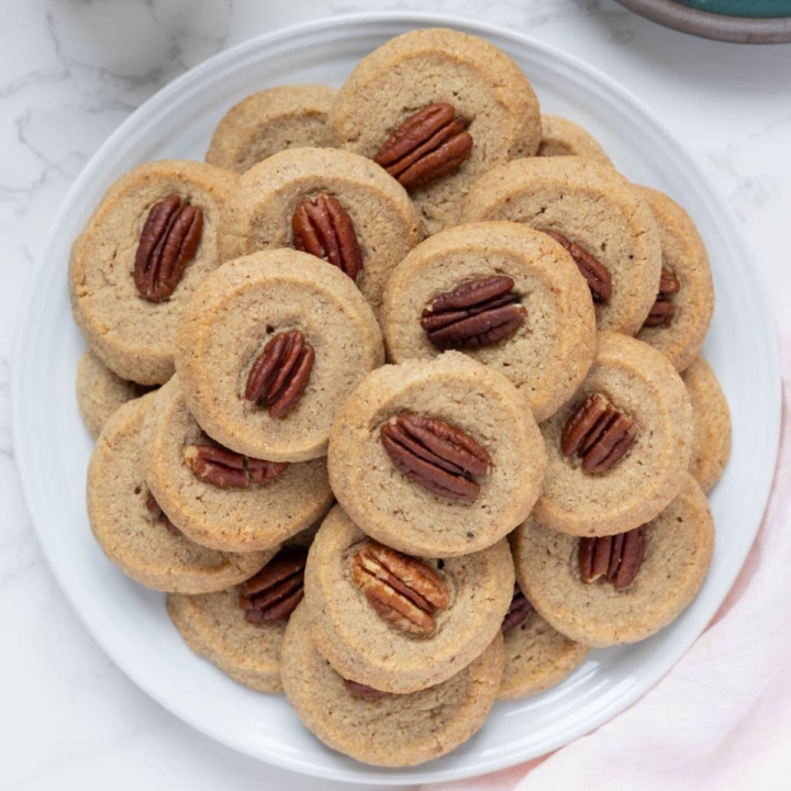 Sourdough discard pecan sandies on a serving plate.