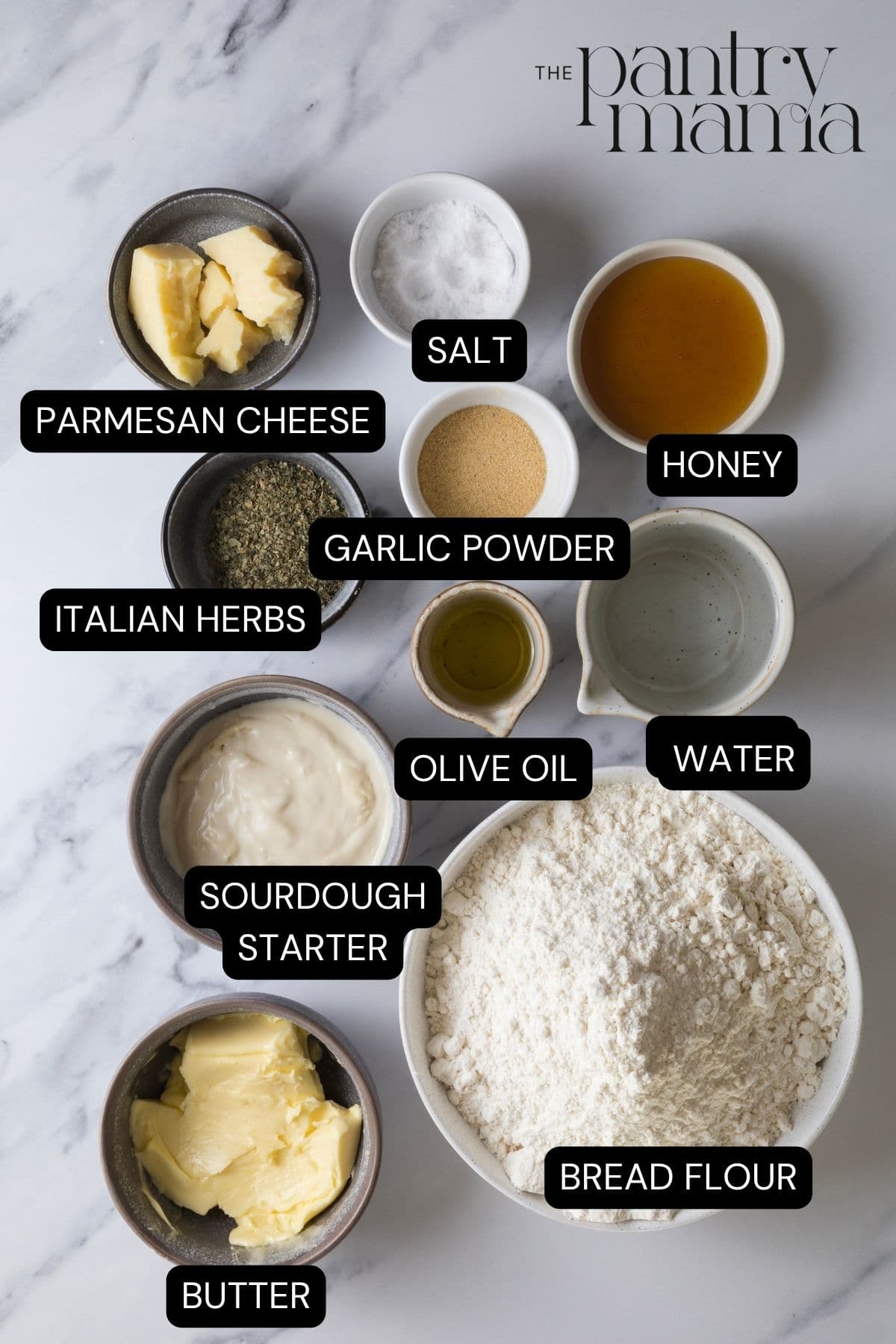 Labeled ingredients on counter to make soft sourdough breadsticks.