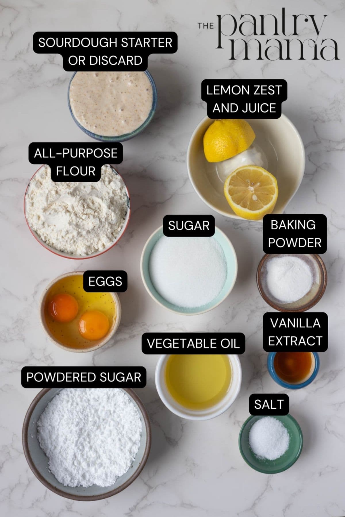 Labeled ingredients on the counter to make sourdough lemon muffins.
